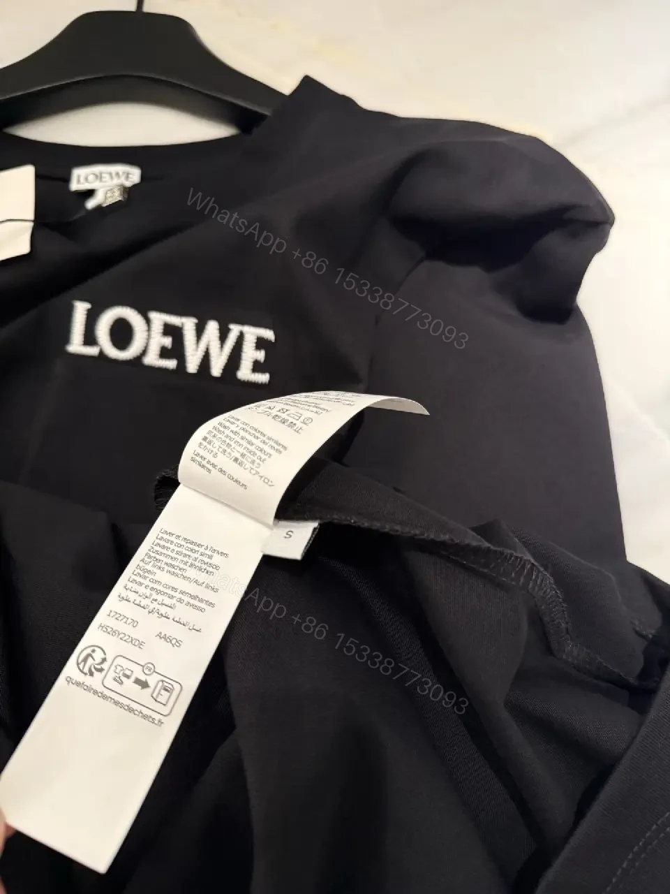 View 4 of Black Cotton Crew Tee with Pocket – Subtle Luxe Comfort