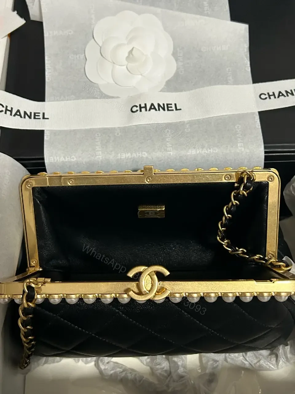 View 8 of Black Quilted Leather Clutch with Pearl Trim, Gold Frame, Elegant