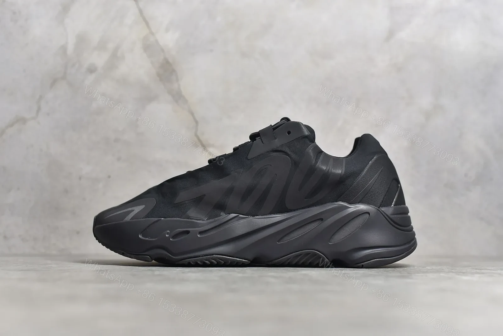 Adidas Yeezy Boost 700 MNVN “Triple Black” Reps — view 1
