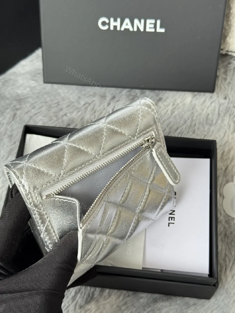 View 5 of Compact Silver Quilted Wallet with Signature Hardware