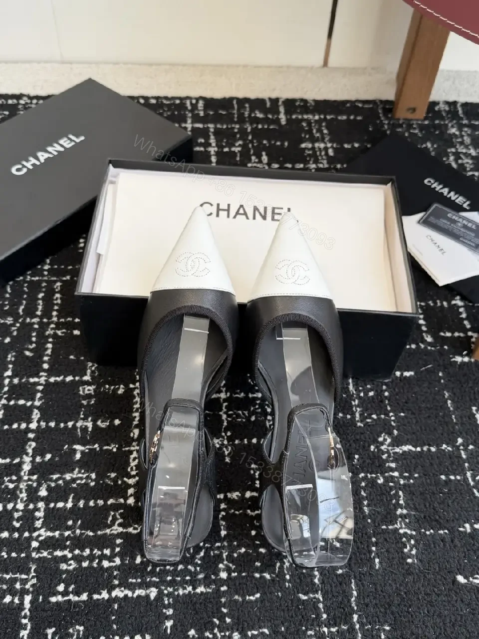 View 5 of Black White Leather Slingback Heels with Chanel Logo, Pointed Toe, 2-inch Heel