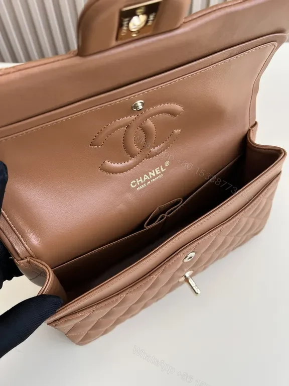 View 5 of Textured Quilted Saddle Bag with Signature Hardware - Brown Leather