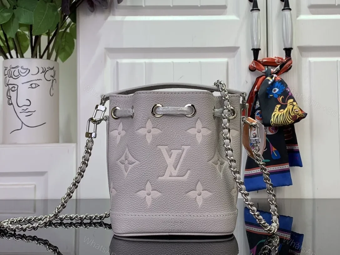 View 5 of Soft-Shadow Monogram Bucket Bag: Modern Texture, Subtle Luxury