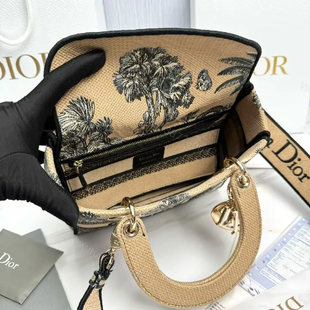 View 5 of Chic Embroidered Mini Handbag: Textured, Crossbody Ready, Luxe