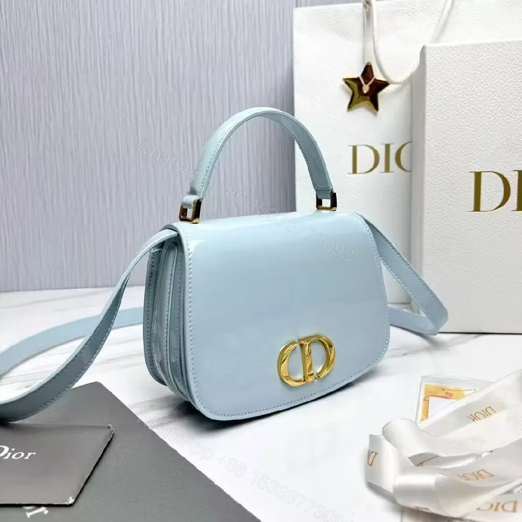 View 6 of Soft Sky Blue Mini Bag with Gold Hardware Logo Accent Bag