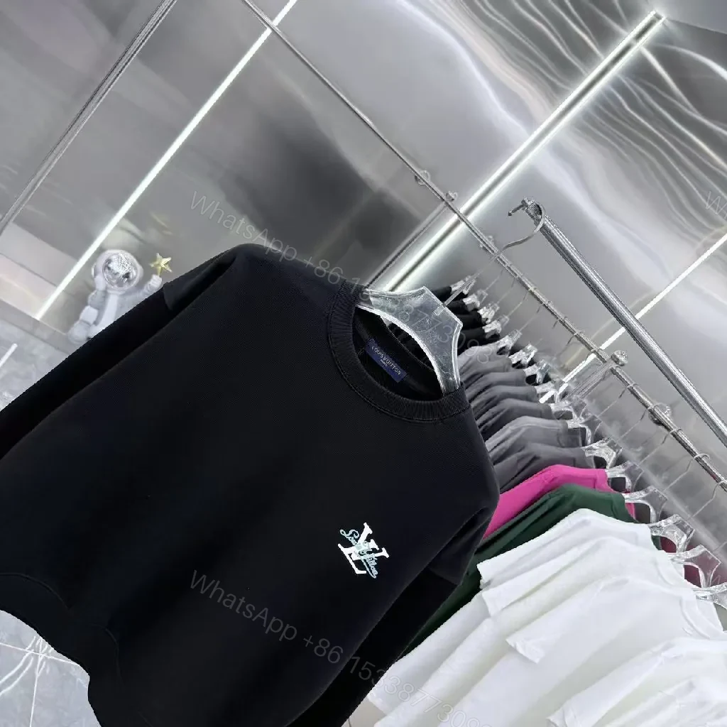 View 3 of Minimalist Black Crewneck with Subtle LV-Accent - Luxury Staple