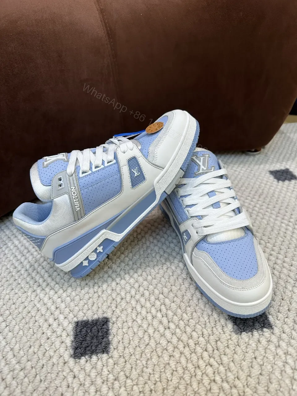 View 4 of Light-Blue Perforated Panels Modern Low-Top Sneakers with LV-Inspired Accents