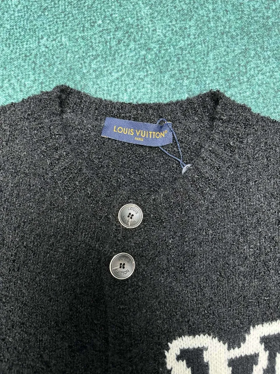 View 2 of Cozy Textured Cardigan: Black Knit with Logo Accent + Everyday Luxury Cardigan