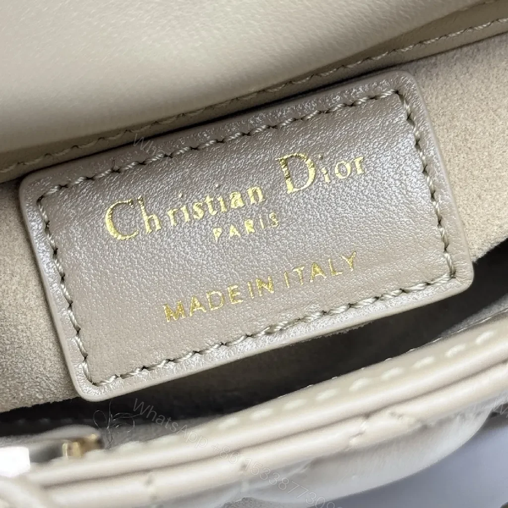 View 8 of Compact Quilted Satchel: Modern Texture, Iconic Details