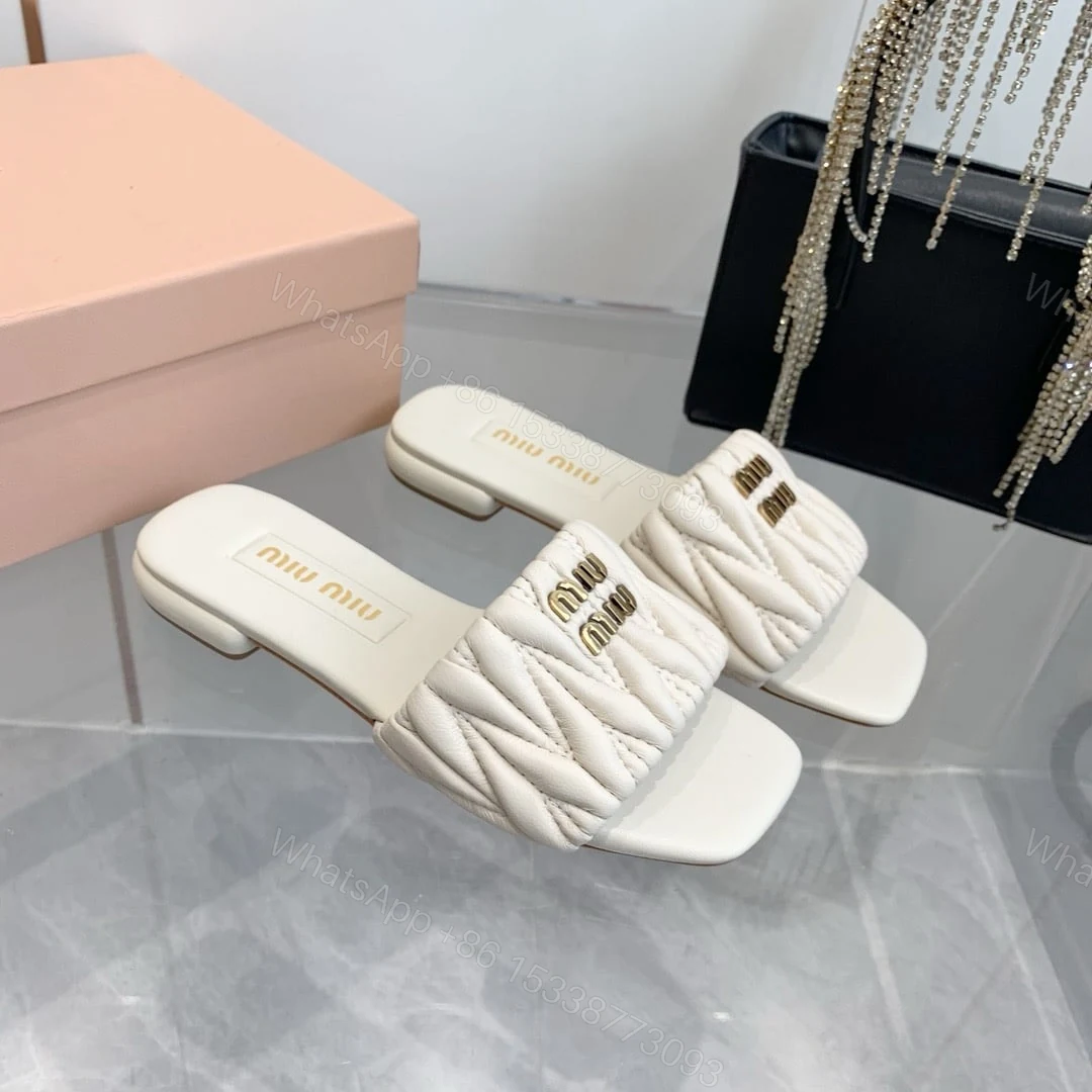 View 3 of MIUMIU MATELASSÉ NAPPA LEATHER SLIDES WHITE 5XX605 88T F0009 F 010