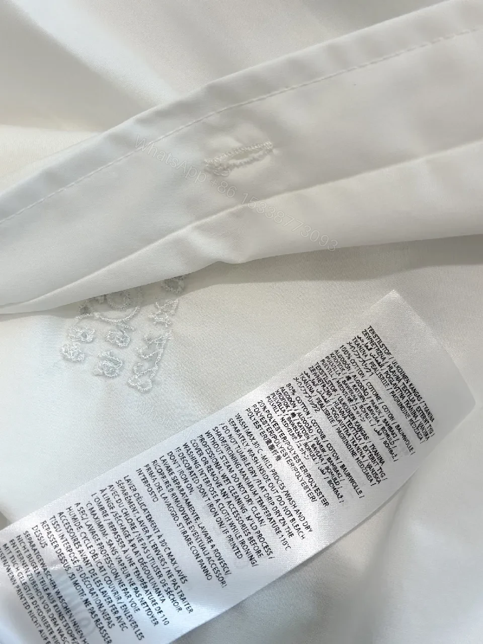 View 9 of White Cotton Shirt Dress Hoodie Detail: Modern Minimal Luxury