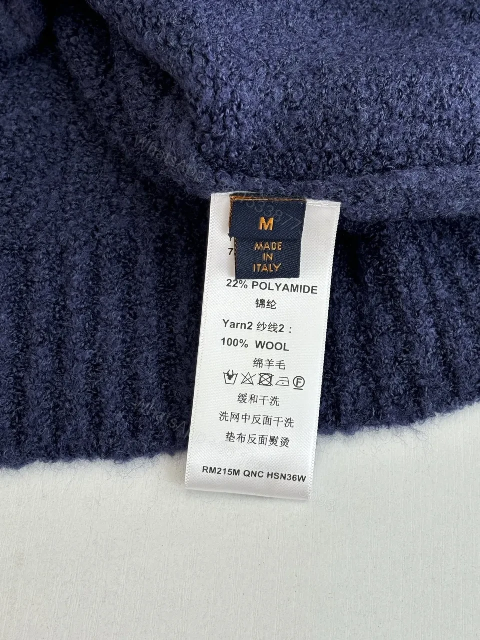 View 3 of Blue Knit Luxury Sweater with Signature Monogram Emblem