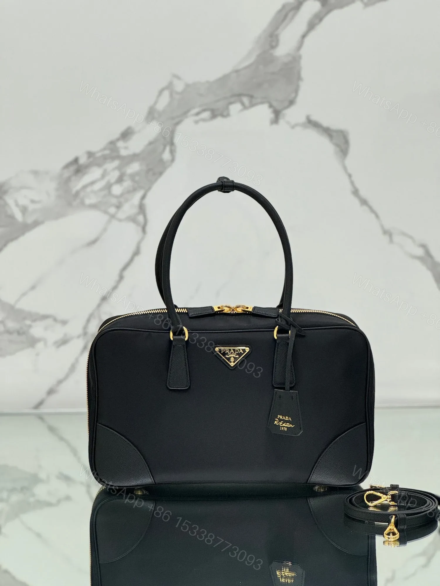 LARGE TOP HANDLE BAG 35 IN BLACK NYLON AND CALFSKIN TRIM — view 1