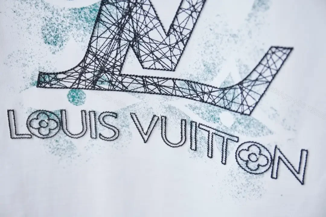 View 6 of Minimalist White Tee with LV Stitch – Premium Everyday Essential