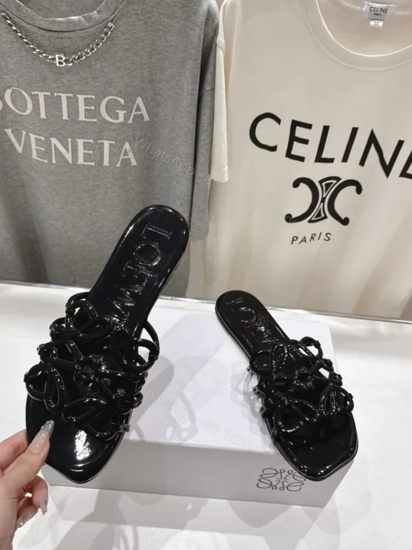 Loewe Leather Petal Anagram Slides in Black — view 1