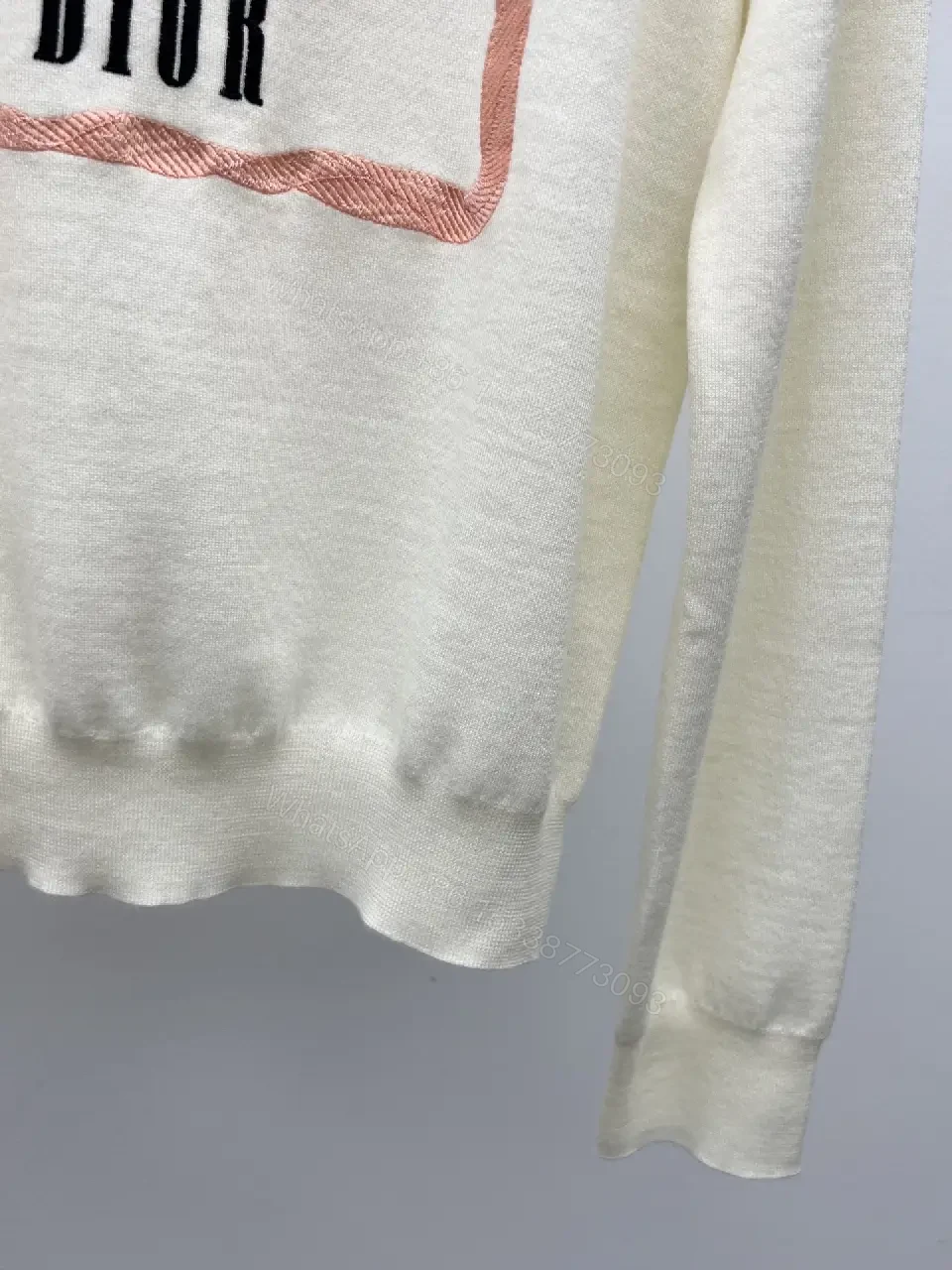 View 7 of cream cotton knit sweater with pink framed monogram print luxury casualwear