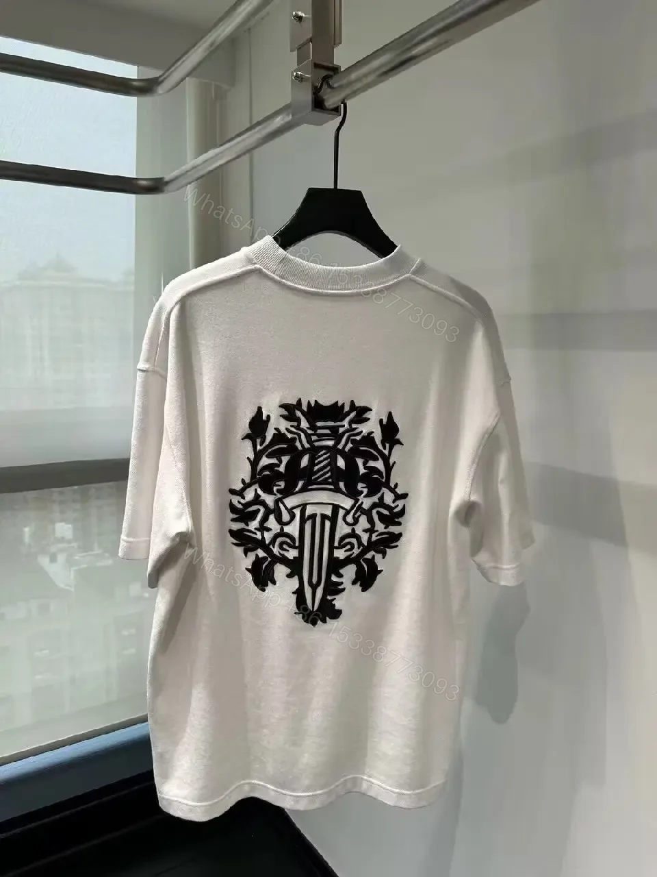 View 3 of Neutral Off-White Cotton Tee: Minimalist, Relaxed Fit, Premium