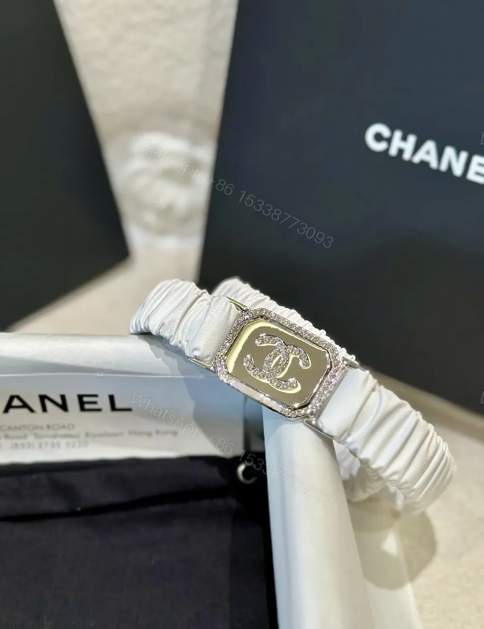 View 2 of Lux White Strap Belt-Style Watch: Pavé Logo Bezel