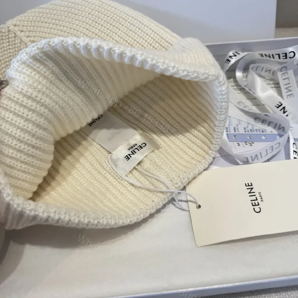View 8 of Cream Knit Beanie + Ribbed Material + Minimalist Style + Subtle Monogram + Beanie