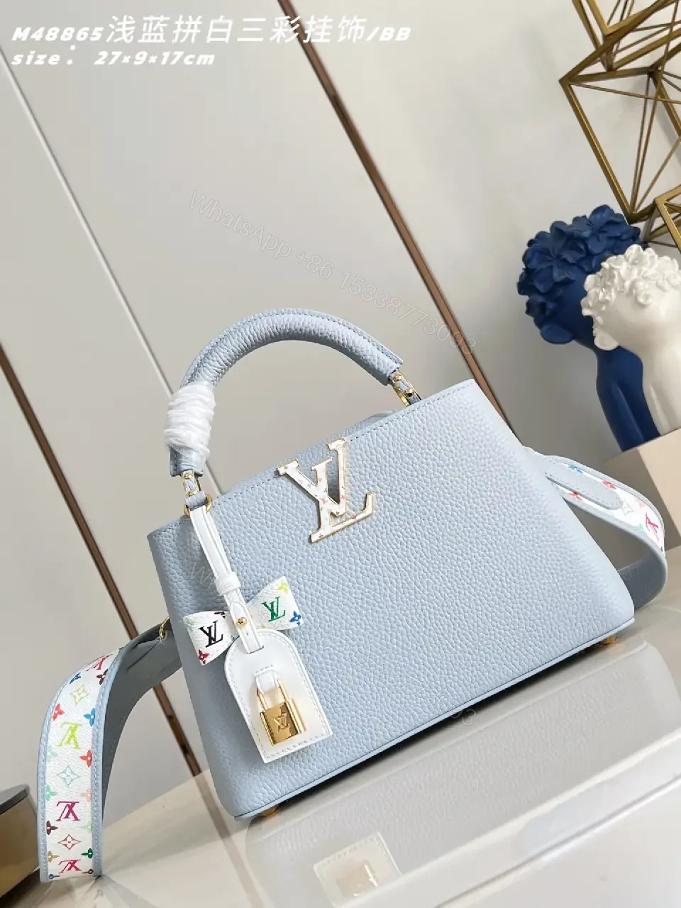 Light Blue Leather Handbag with Gold Hardware Details — view 1