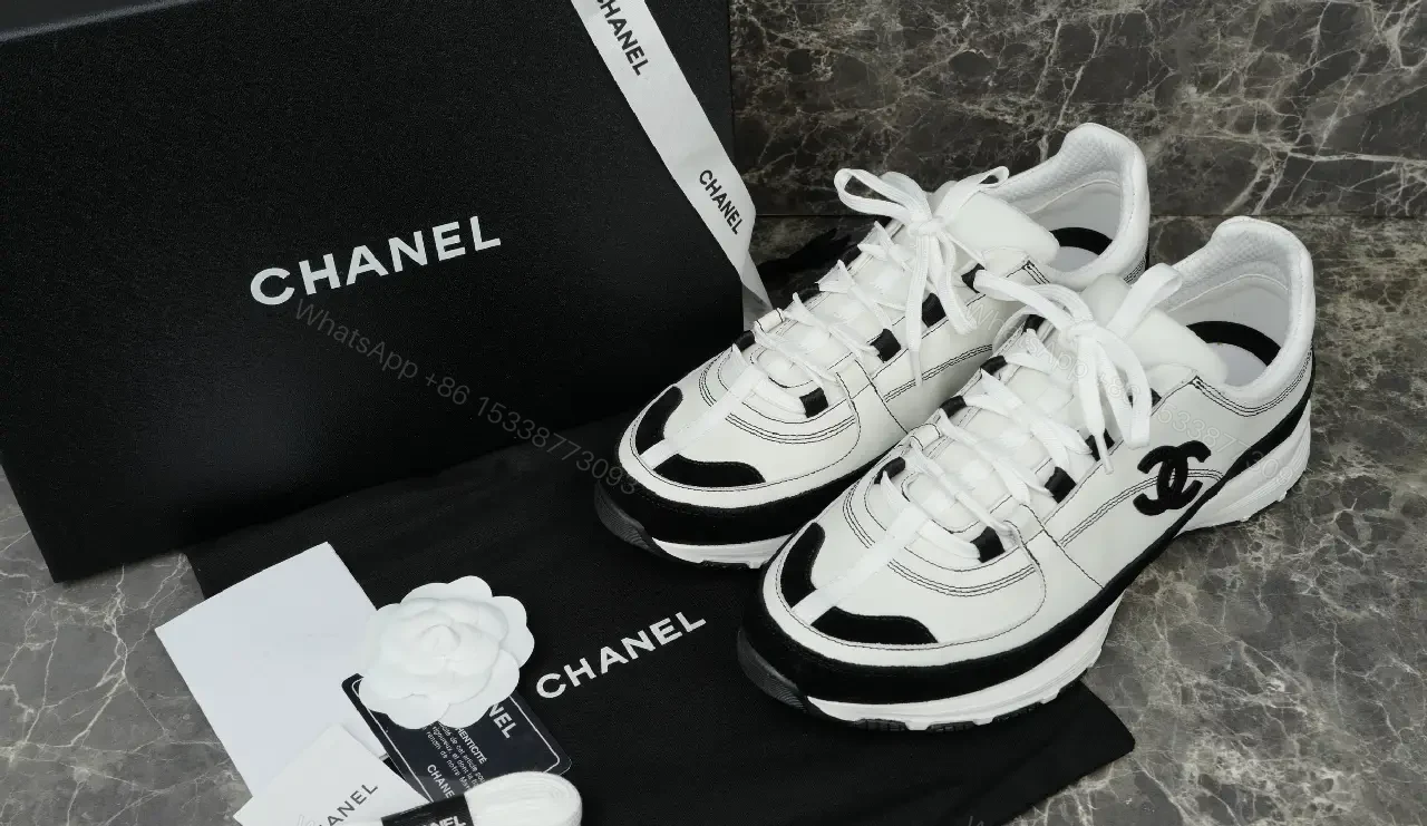 View 4 of White Leather Chunky Sneaker with Chanel Logo Details