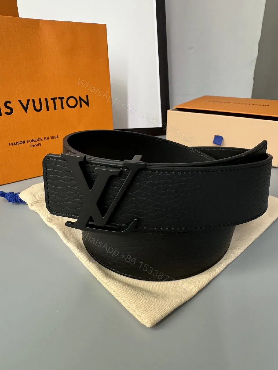View 9 of Minimalist Black Leather Belt with Subtle LV Buckle