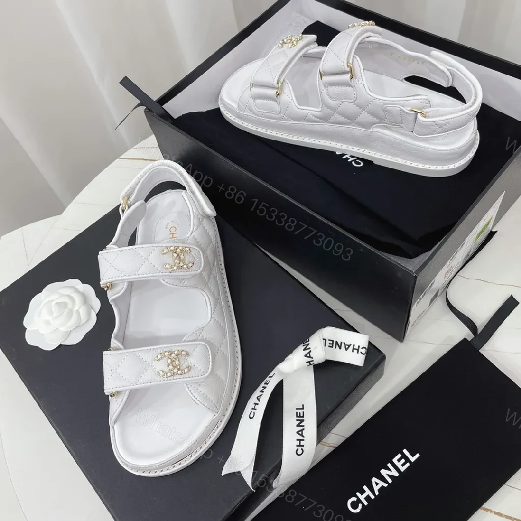 View 2 of White Quilted Leather Sandals with Gold Logo Hardware