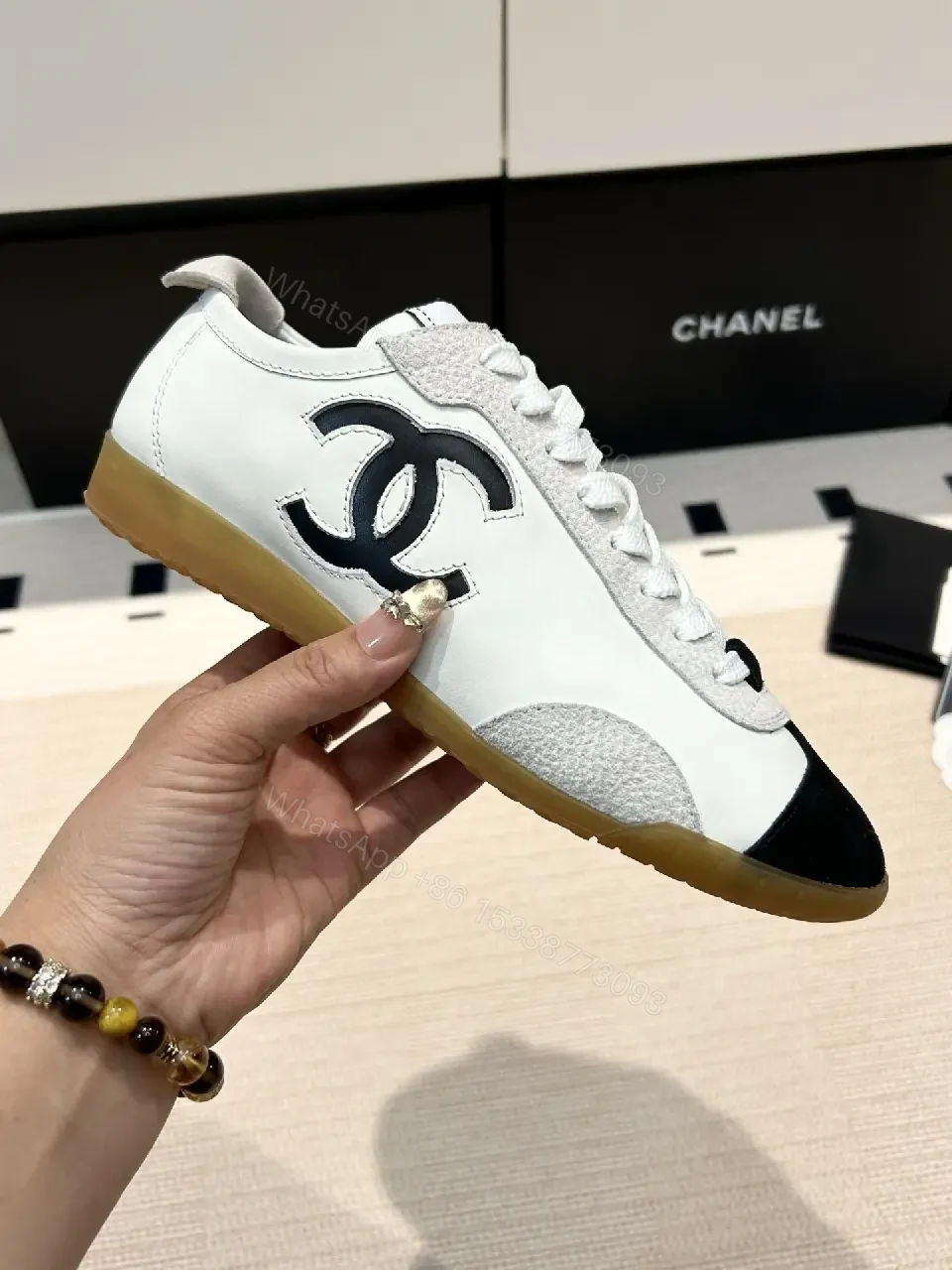 View 9 of White Leather Sneaker with Bold Logo, Gum Sole, Luxury Chic