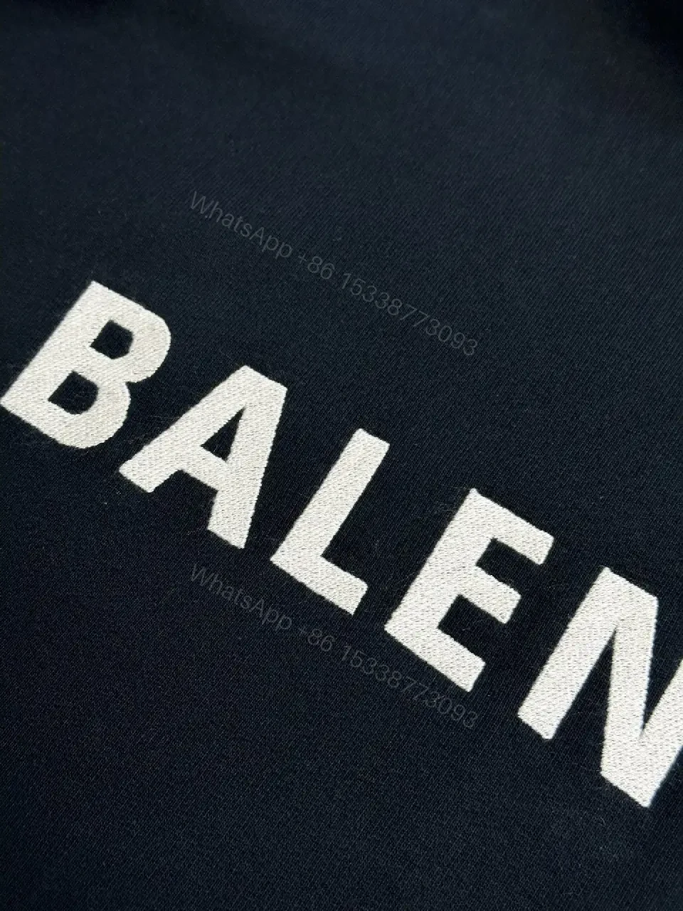 View 9 of Cozy Luxe Hoodie: Subtle Iconography, Everyday Versatility