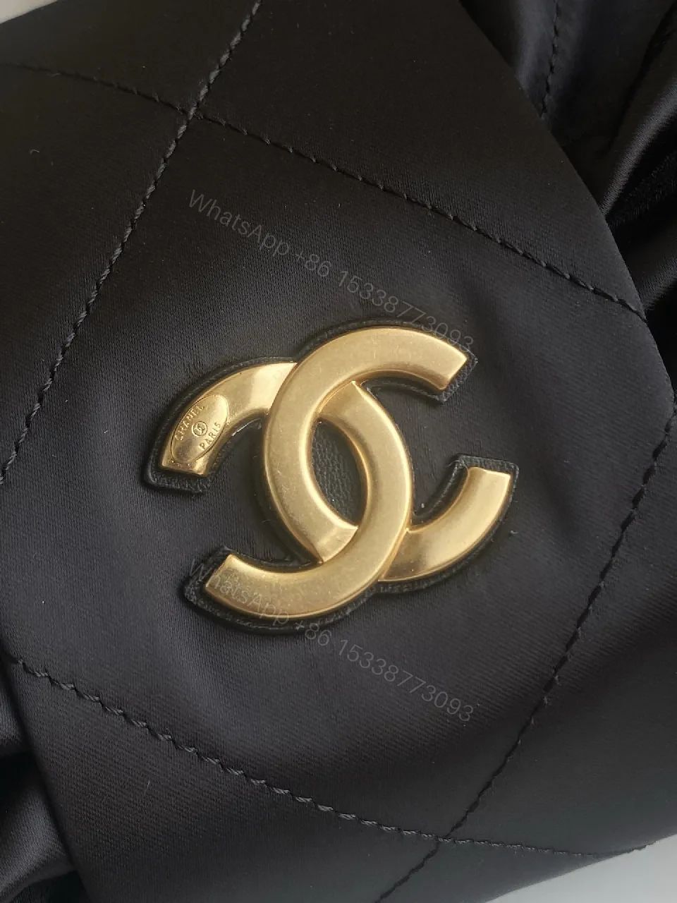 View 6 of Quilted Black Bag with Gold Emblem - Luxury Everyday Style