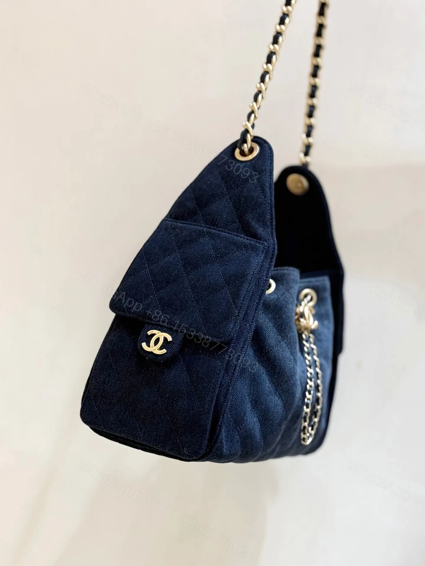 View 7 of CHANEL 25 HANDBAG 30 IN DENIM GOLD HARDWARE
