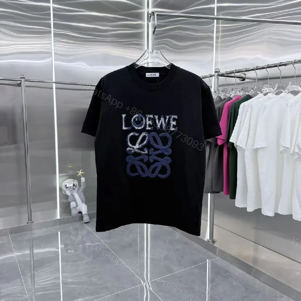 Black Cotton Tee + Textured Logo + Streetwear + Subtle Luxe Detail + T-Shirt — view 1