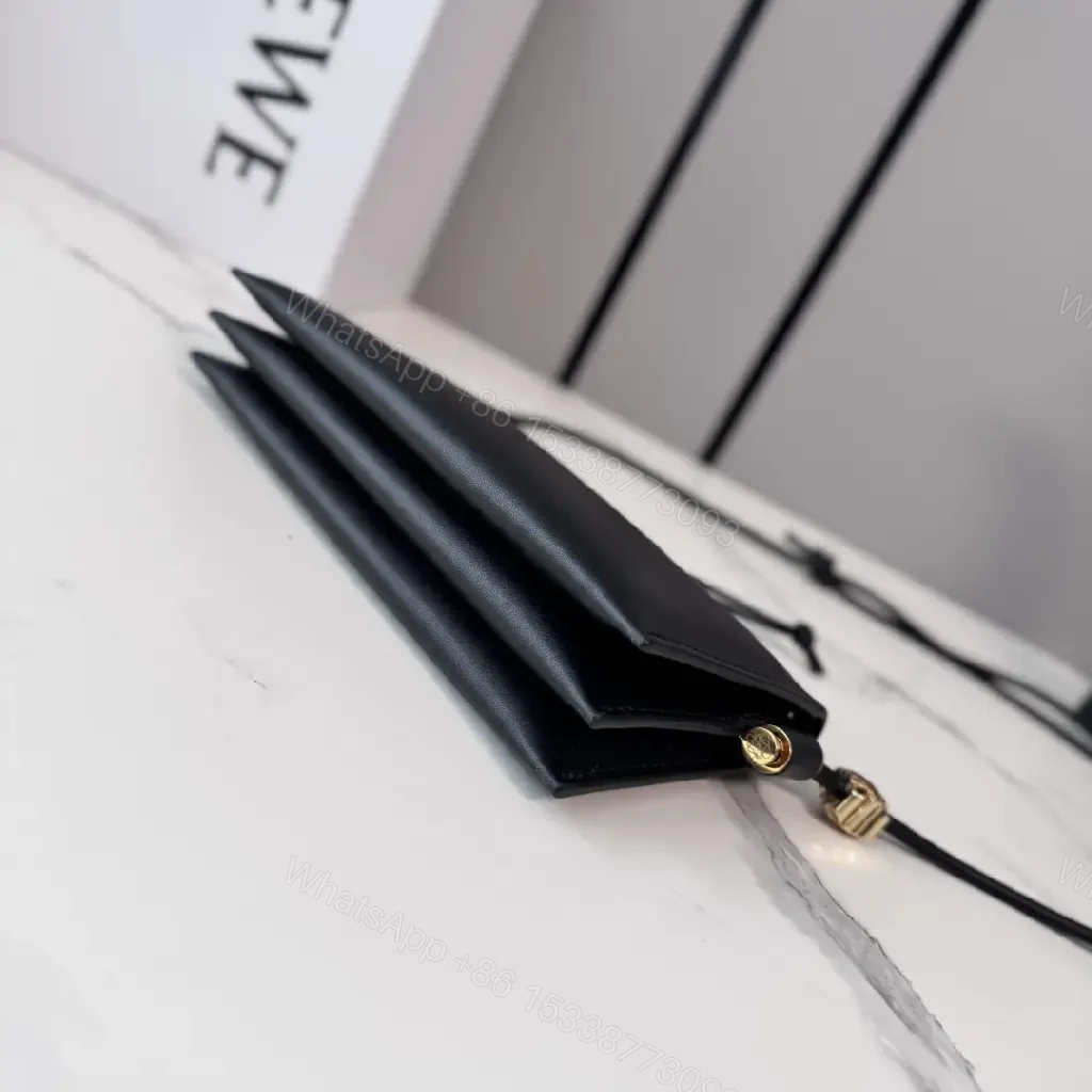 View 10 of Chic Black Leather Crossbody with Gold Hardware