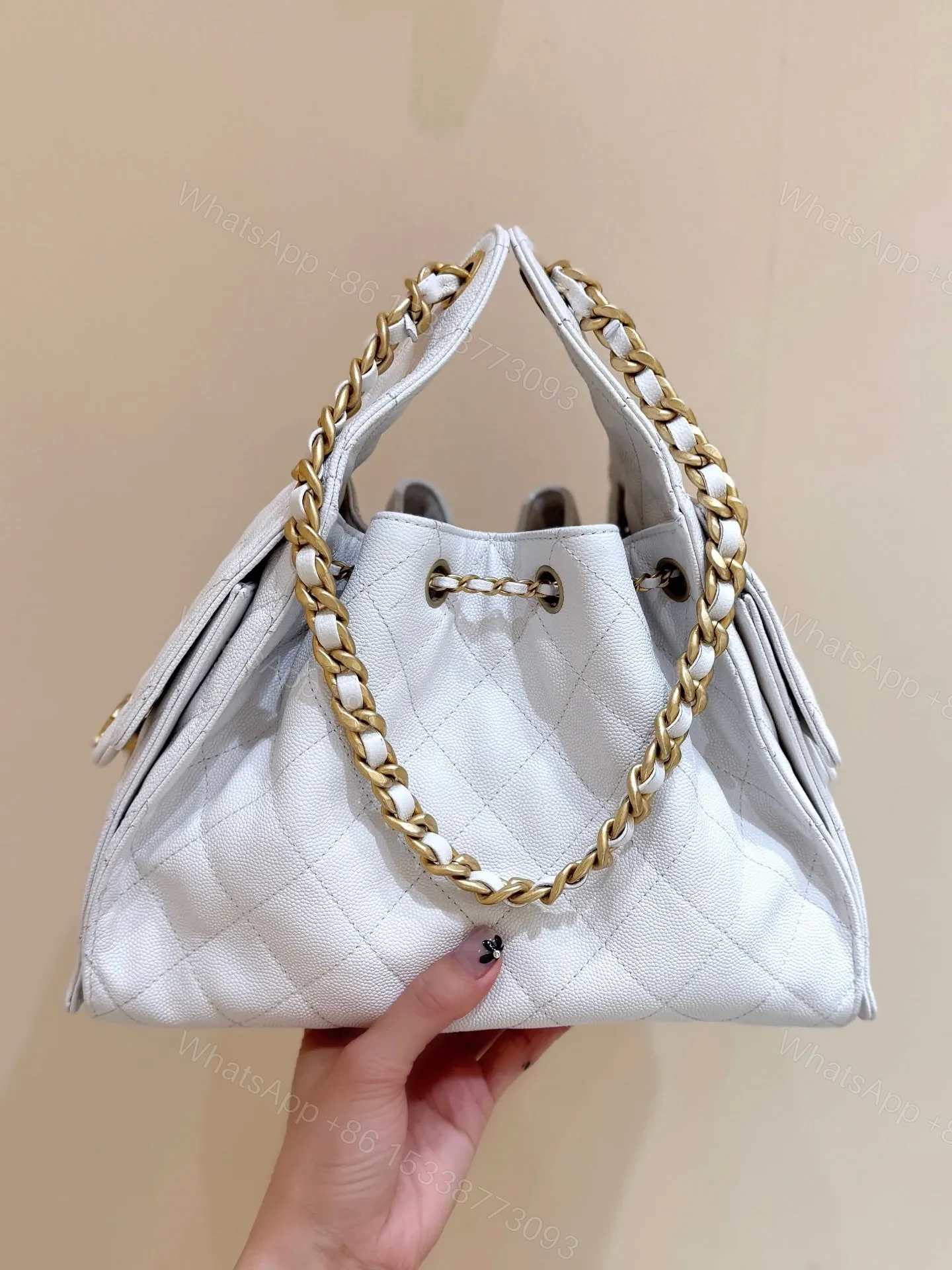 View 5 of CHANEL 25 HANDBAG IN WHITE 30 GOLD HARDWARE