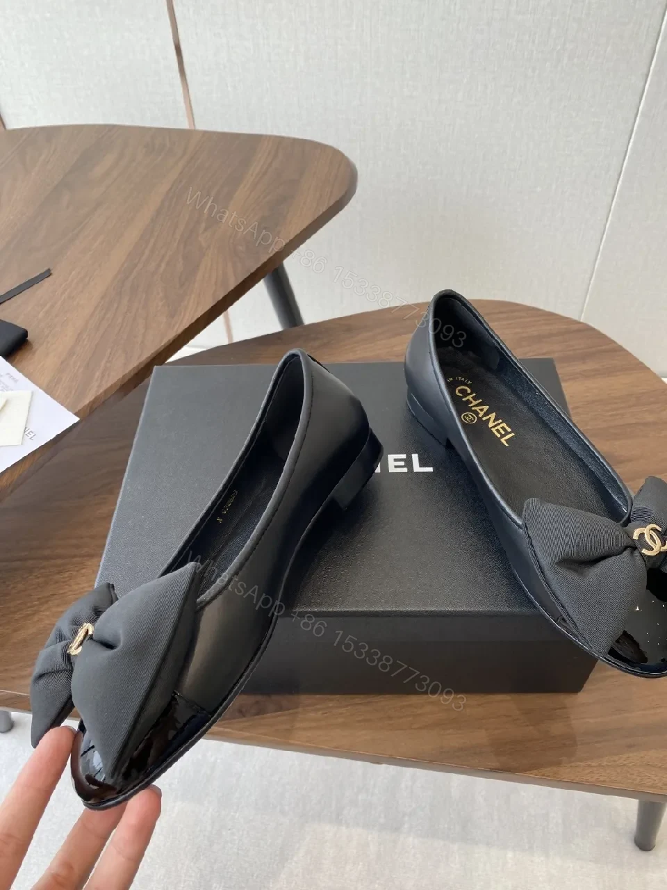 View 2 of Lux Black Leather Bow Flats with Gold Hardware