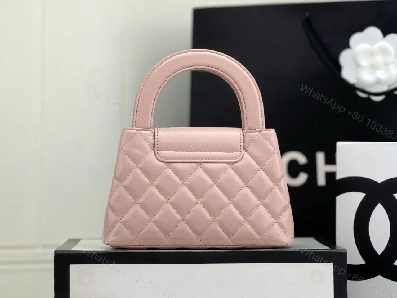 View 6 of Soft Pink Quilted Mini Bag with Gold Hardware, Elegant Twist, Mini Bag