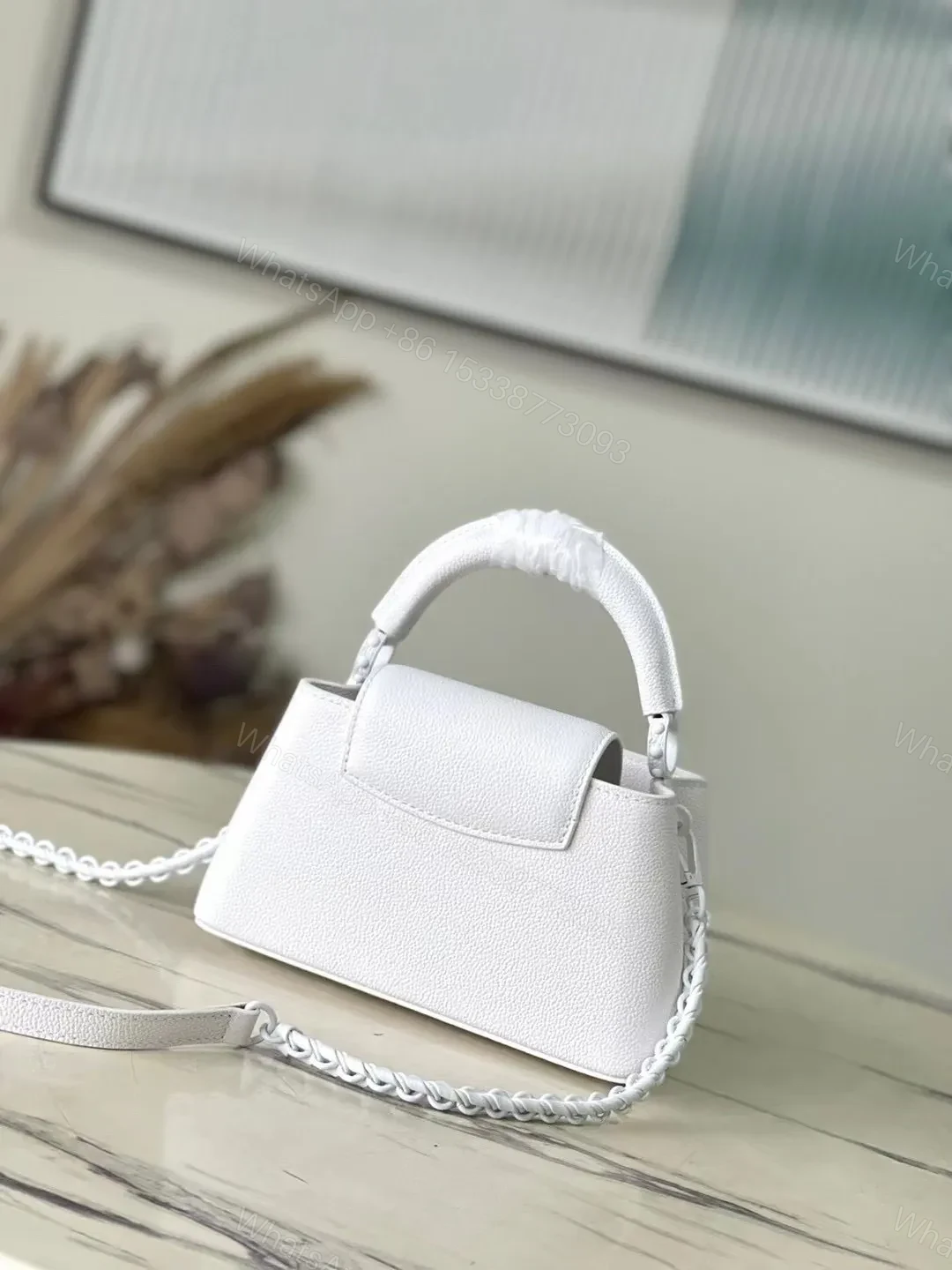 View 3 of Louis Vuitton LV Capucines Handbags White Leather 21cm