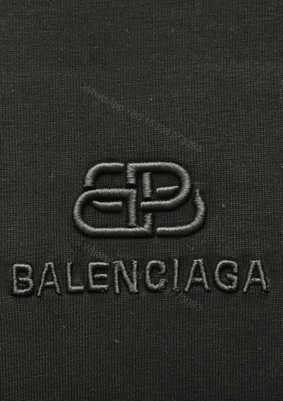 View 4 of Textured Logo Black Knit Tee – Oversized Luxury Streetwear