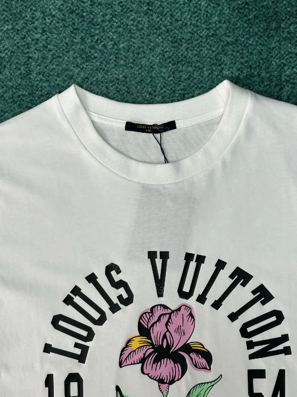 View 5 of Casual Luxury Graphic Tee: Subtle Floral, Cotton Blend, Relaxed Fit
