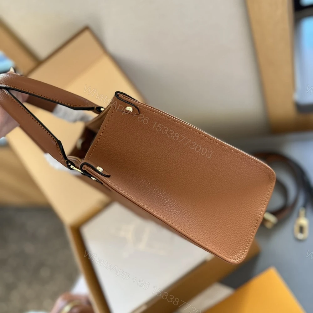 View 4 of Louis Vuitton Onthego MM Monogram Empreinte Cognac 35Cm M12775