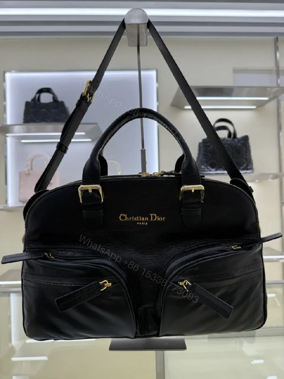 View 8 of Compact Luxury Satchel: Black Leather, Gold Hardware, Structured Style