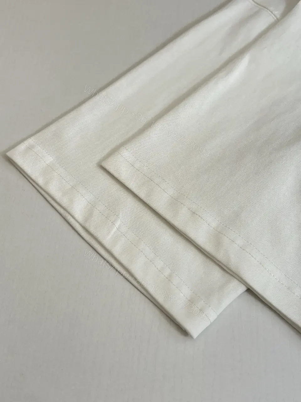 View 2 of Neutral Cotton Logo Tee: Minimalist Luxe, Soft-Drape, Durable
