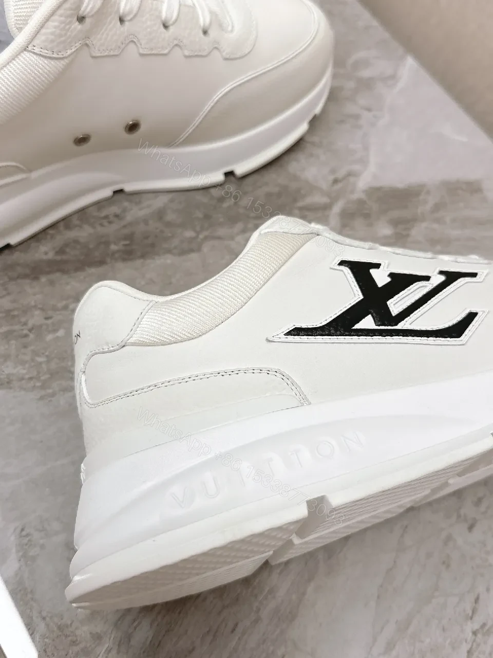 View 7 of White Leather Low-Profile Sneakers with Monogram Detailing