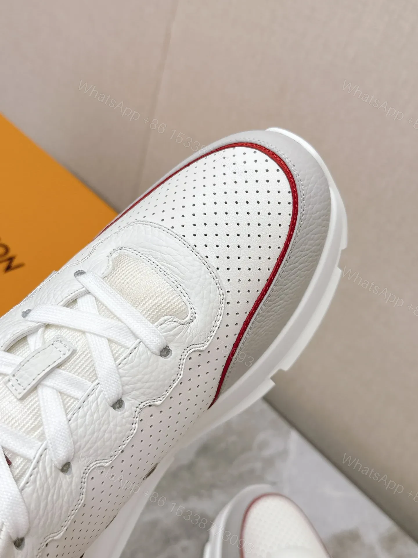 View 2 of LV Women White Leather Red Accent Sneakers