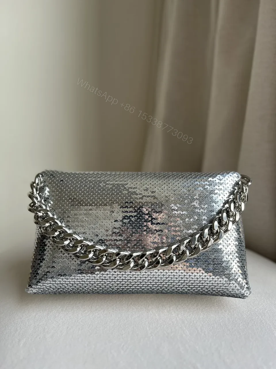 View 7 of Chic Metallic Crossbody Clutch: Bold Chain Luxury