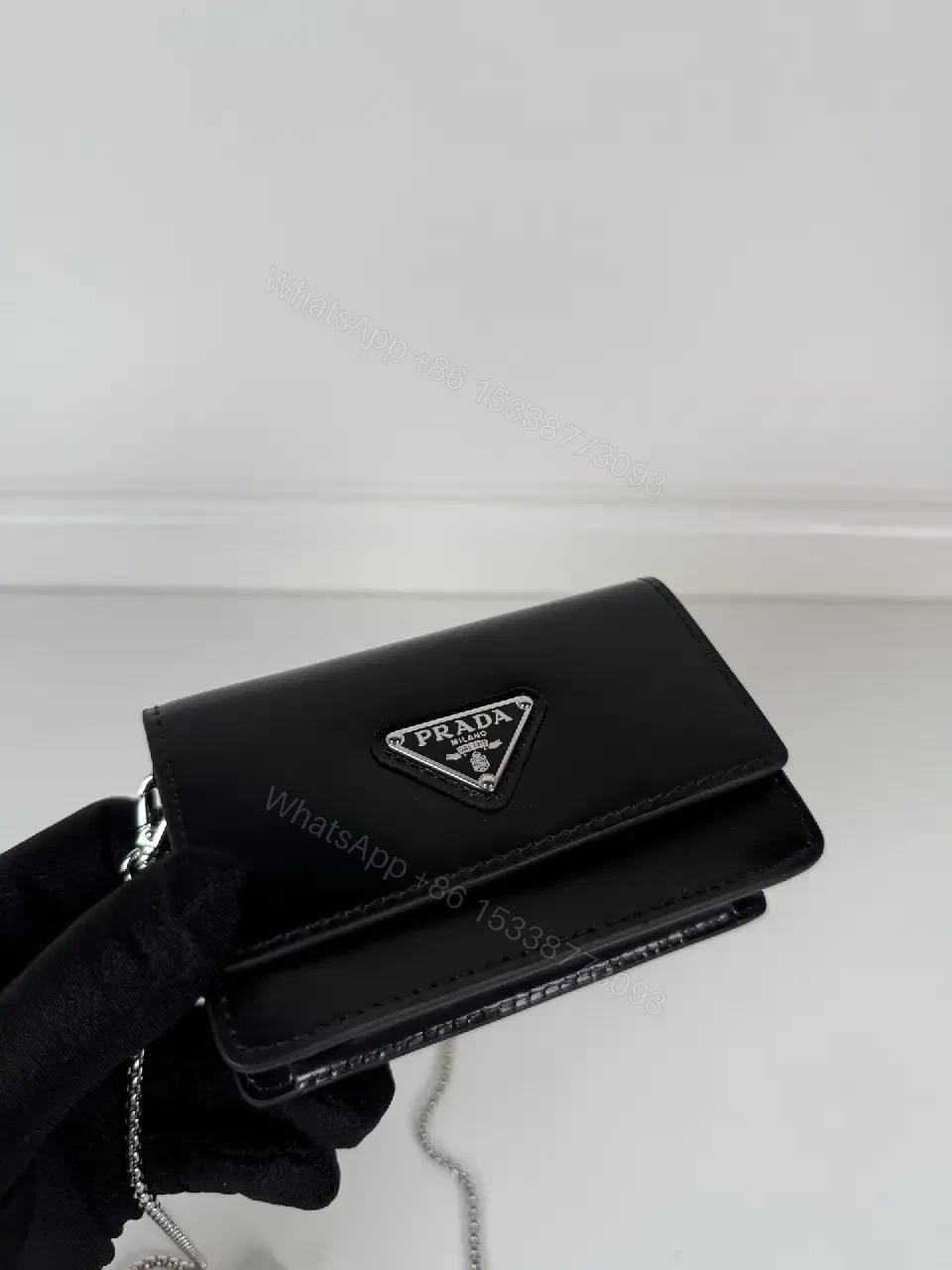 View 8 of Chic Black Leather Mini Bag with Signature Logo Chain
