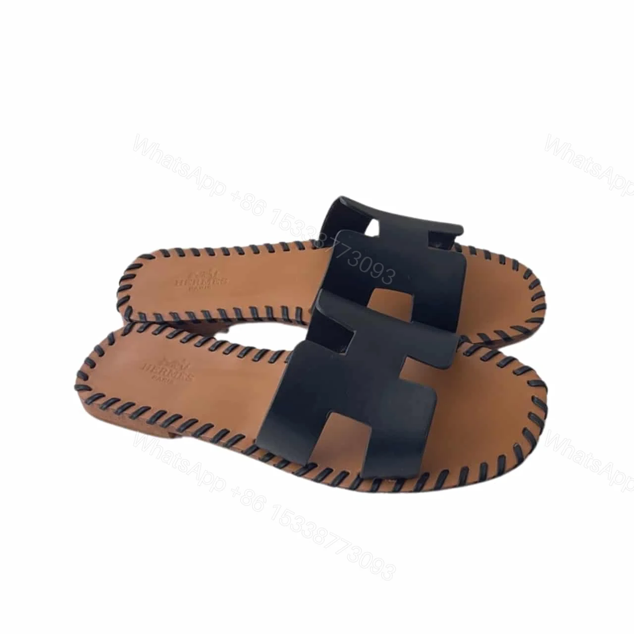 HERMÈS ORAN SANDALS STITCHING IN BLACK AND BROWN — view 1