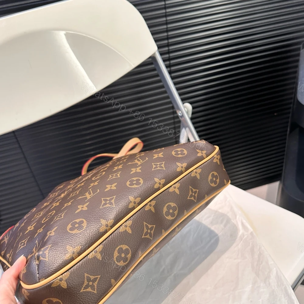 View 6 of LOUIS VUITTON MONOGRAM CANVAS ODEON PM BAG BROWN 29CM
