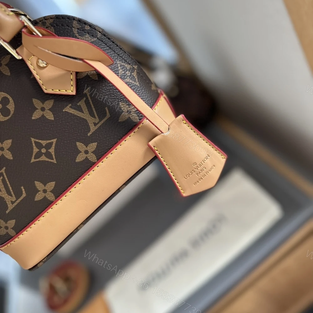 View 3 of Louis Vuitton Alma Nano Bag Monogram Brown 18Cm M82717