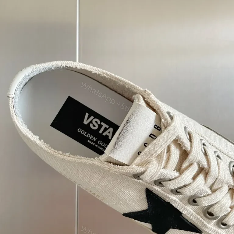 View 3 of Chic Canvas Star Sneakers - Signature Detail, Unisex